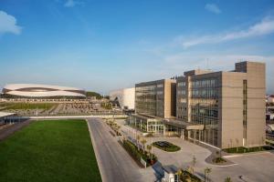 an aerial view of a campus with buildings and a field at Park Inn by Radisson Samsun in Samsun