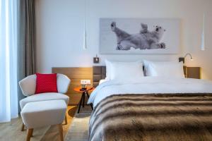 Ліжко або ліжка в номері Radisson Blu Hotel Reussen, Andermatt