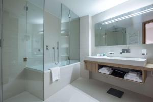 A bathroom at Radisson Blu Hotel Reussen, Andermatt