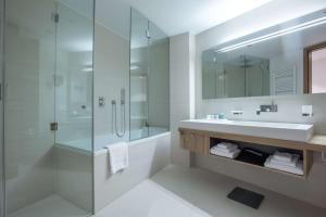 Ванна кімната в Radisson Blu Hotel Reussen, Andermatt