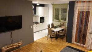 Kuchyň nebo kuchyňský kout v ubytování Apartman Zoe