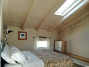 Postel nebo postele na pokoji v ubytování Casa di Vania