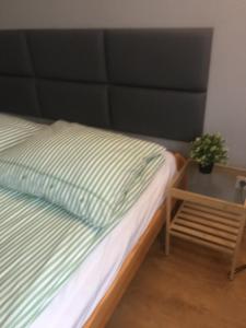 Posteľ alebo postele v izbe v ubytovaní livingROOM_Wroc_Mosiężna