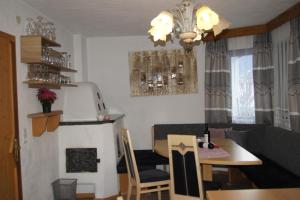 Posezení v ubytování Ferienhaus Alpenroyal