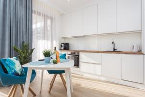 Η κουζίνα ή μικρή κουζίνα στο City of the Kings - Smile Apartment