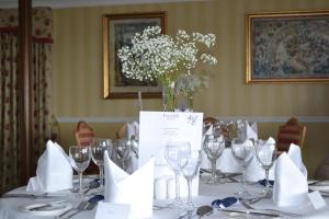 A restaurant or other place to eat at Fernhill Hotel