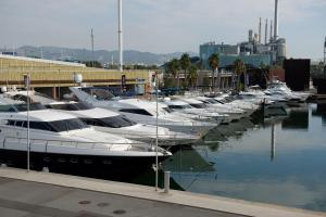 a group of boats docked in a marina at Boat Hotel Barcelona in Barcelona