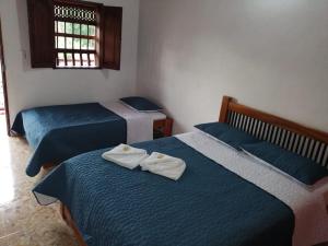Postel nebo postele na pokoji v ubytování Hotel Dulce Campestre