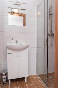 Kúpeľňa v ubytovaní Apartamenty GoszóWita