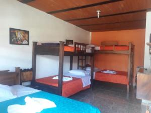 Postel nebo postele na pokoji v ubytování Hotel Dulce Campestre