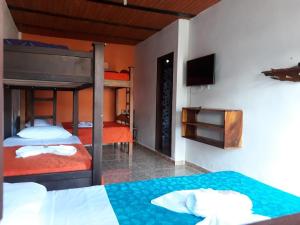 Postel nebo postele na pokoji v ubytování Hotel Dulce Campestre