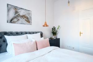 Posteľ alebo postele v izbe v ubytovaní Apartament Nowe Miasto - Skwer Malarzy