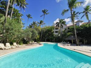 Piscina de la sau aproape de Villas Tropical Los Corales Beach & Spa