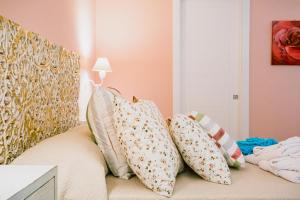 Postel nebo postele na pokoji v ubytování Una Perla Nel Verde