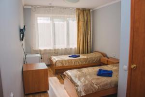 Postel nebo postele na pokoji v ubytování Hotel Tahar