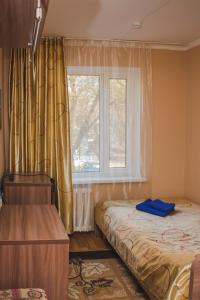 Postel nebo postele na pokoji v ubytování Hotel Tahar