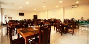 Restoran või mõni muu söögikoht majutusasutuses Syariah Arini Hotel