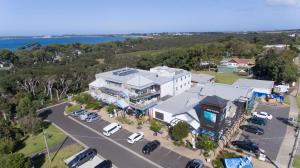an aerial view of a building with a parking lot at The Island Accommodation in Phillip Island