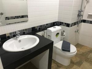 Koupelna v ubytování TTT Hotel