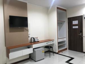 TV a/nebo společenská místnost v ubytování TTT Hotel