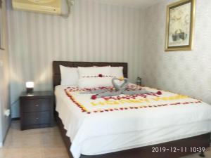 Voodi või voodid majutusasutuse Jos & Hanny Homestay toas