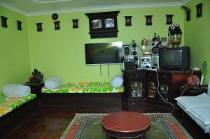 TV o dispositivi per l'intrattenimento presso Nagarjun Home Stay
