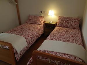 Postel nebo postele na pokoji v ubytování Relais diVINO