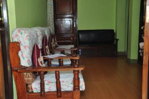 Area soggiorno di Nagarjun Home Stay