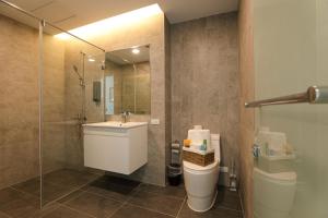 Ein Badezimmer in der Unterkunft Shi Guang Sea View