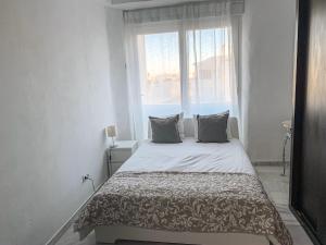Posteľ alebo postele v izbe v ubytovaní Apartament Benalmadena Marina SOL
