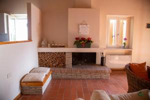 A seating area at Ca' le cerque, villa surrounded by the Marche nature