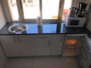 A kitchen or kitchenette at TABLERO 403, ENCANTADOR Apto 8 pax cerca PLAYA DEL INGLES
