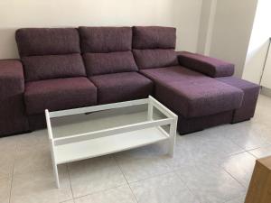 A seating area at TABLERO 403, ENCANTADOR Apto 8 pax cerca PLAYA DEL INGLES