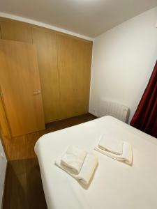 A bed or beds in a room at P&C Dolsa