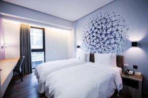 Postel nebo postele na pokoji v ubytování Innk + 9 fotografií