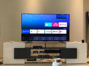 A television and/or entertainment centre at Obhur Residence 2