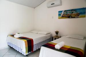 Кровать или кровати в номере Pousada Cheiro de Cacau