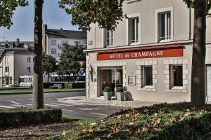 a building on the corner of a street at H&ocirc;tel de Champagne in Angers