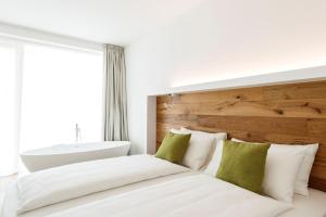 Postel nebo postele na pokoji v ubytování ALEA - Garda Lake Suite