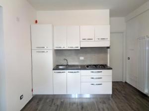 A kitchen or kitchenette at Caput Mundi Anagnina III