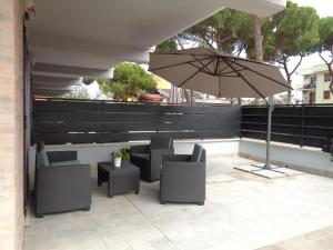 A seating area at Caput Mundi Anagnina III