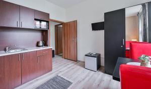 Kuchyňa alebo kuchynka v ubytovaní Rabie Aparthotel