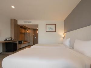 Katil atau katil-katil dalam bilik di Fortune View Khong Hotel Nakhon Phanom