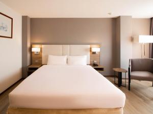 Katil atau katil-katil dalam bilik di Fortune View Khong Hotel Nakhon Phanom