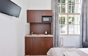 Posteľ alebo postele v izbe v ubytovaní Rabie Aparthotel