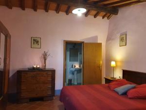 Postel nebo postele na pokoji v ubytování Castello di Pratelli