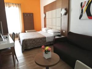 Postel nebo postele na pokoji v ubytování La Casarana Wellness Ecoresort + 37 fotografií