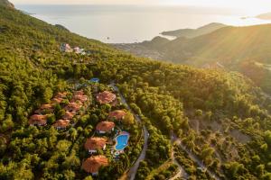 an aerial view of a resort in the mountains at Montana Pine Resort - All Inclusive in Oludeniz