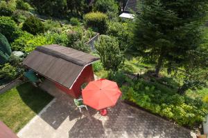 an overhead view of a dog house with an umbrella at Haus Sonnenhang in Friesenheim