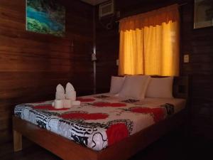 Postel nebo postele na pokoji v ubytování BING-VICE Tourist Inn